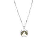 A silver chain necklace with a minimalist pendant shaped like a cat's face, featuring a silver border and two colored sections: one in dark grey and one in cream white.
