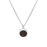 A silver chain necklace with a small cat-shaped pendant featuring a dark brown oval face and white ears, shown on a plain white background.