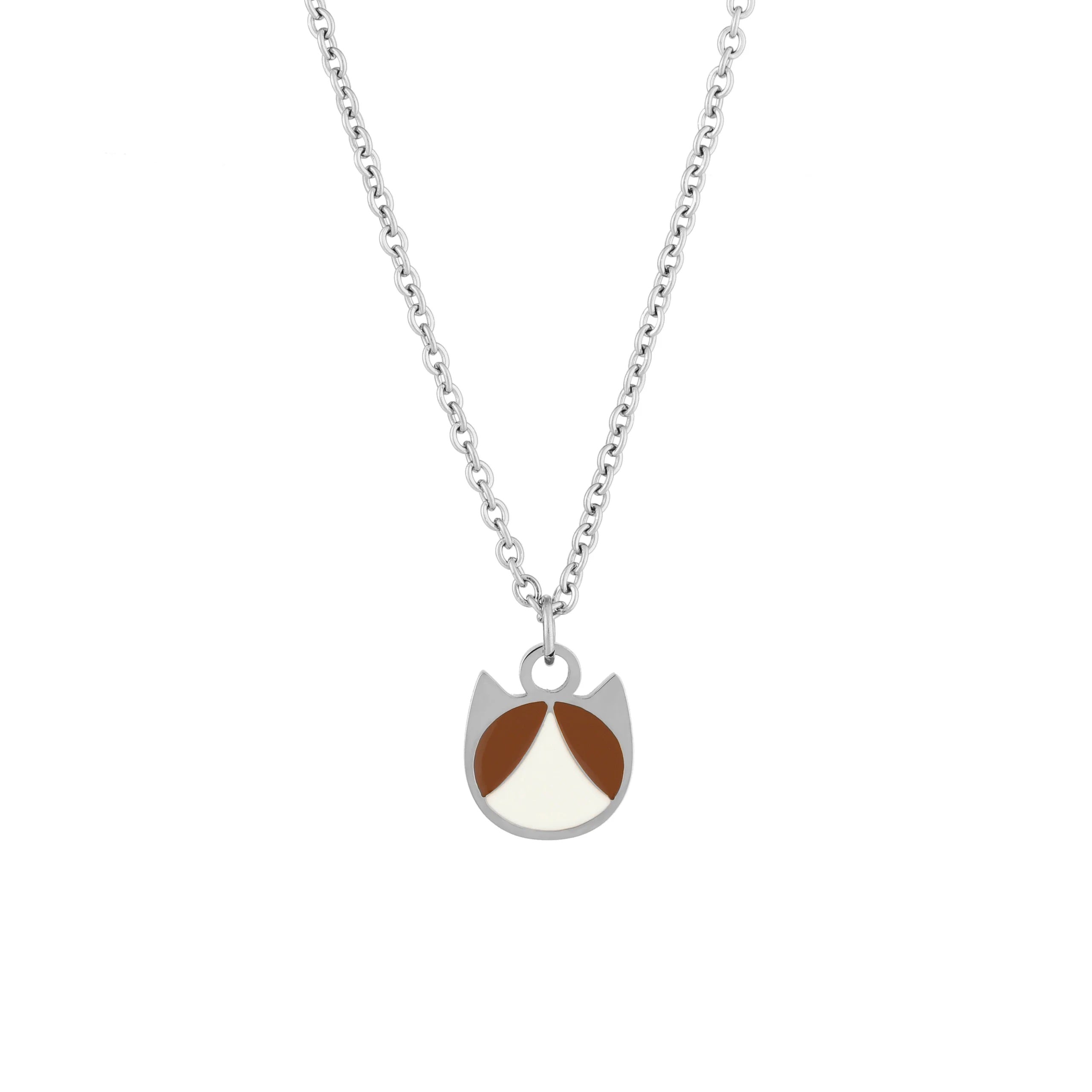 A silver chain necklace with a minimalist pendant shaped like a cat's face, featuring a white and brown enamel design, shown on a plain white background.