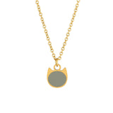 Gold necklace with a cat-shaped minimalist charm with a grey enamel center on a white background