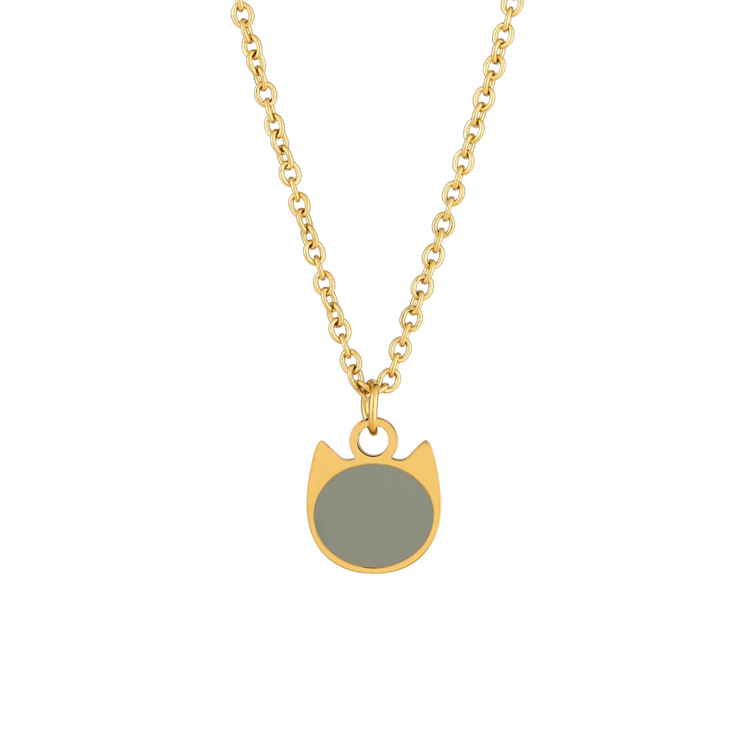 Gold necklace with a cat-shaped minimalist charm with a grey enamel center on a white background