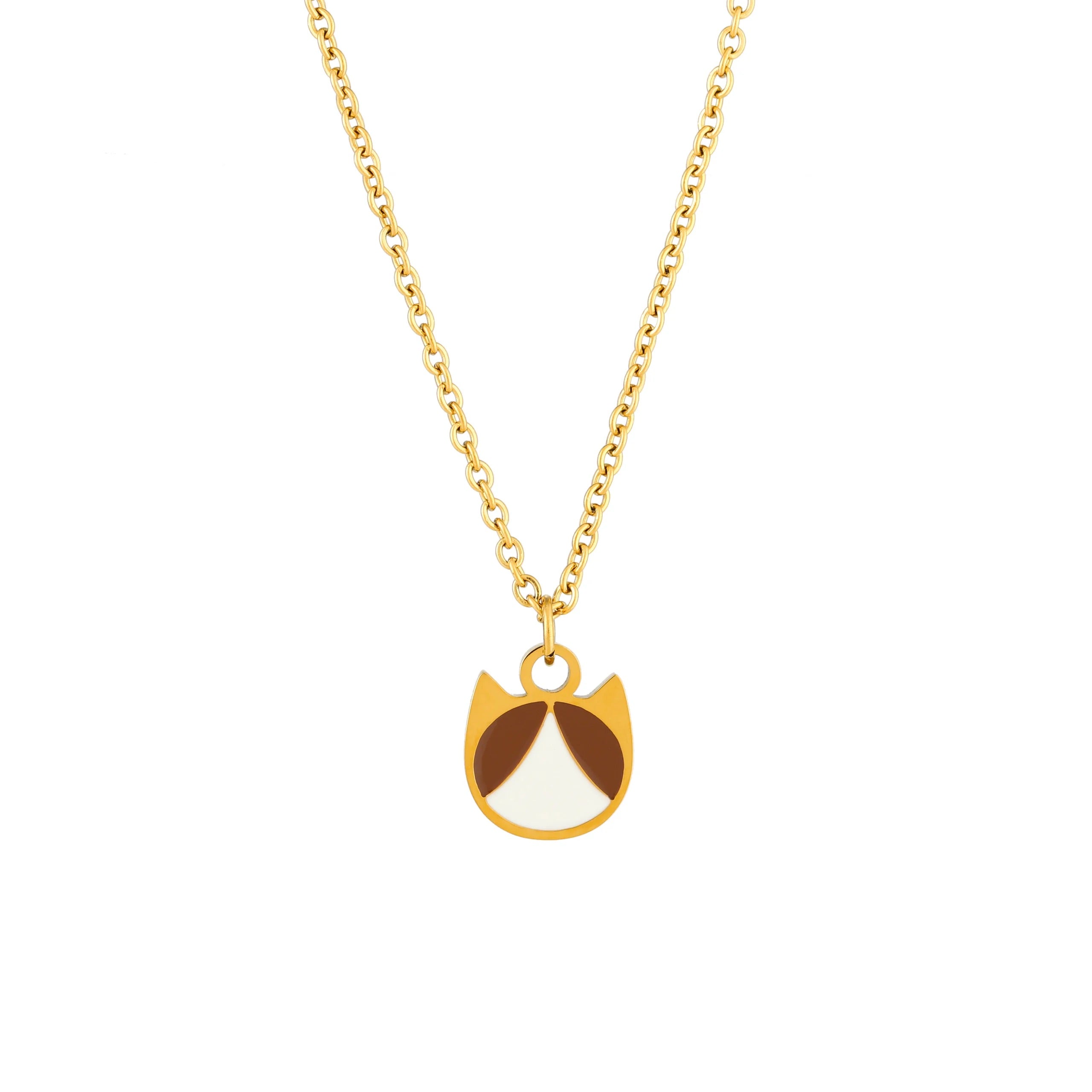 A gold chain necklace with a stylized cat-face pendant featuring white and brown enamel details, shown against a plain white background.