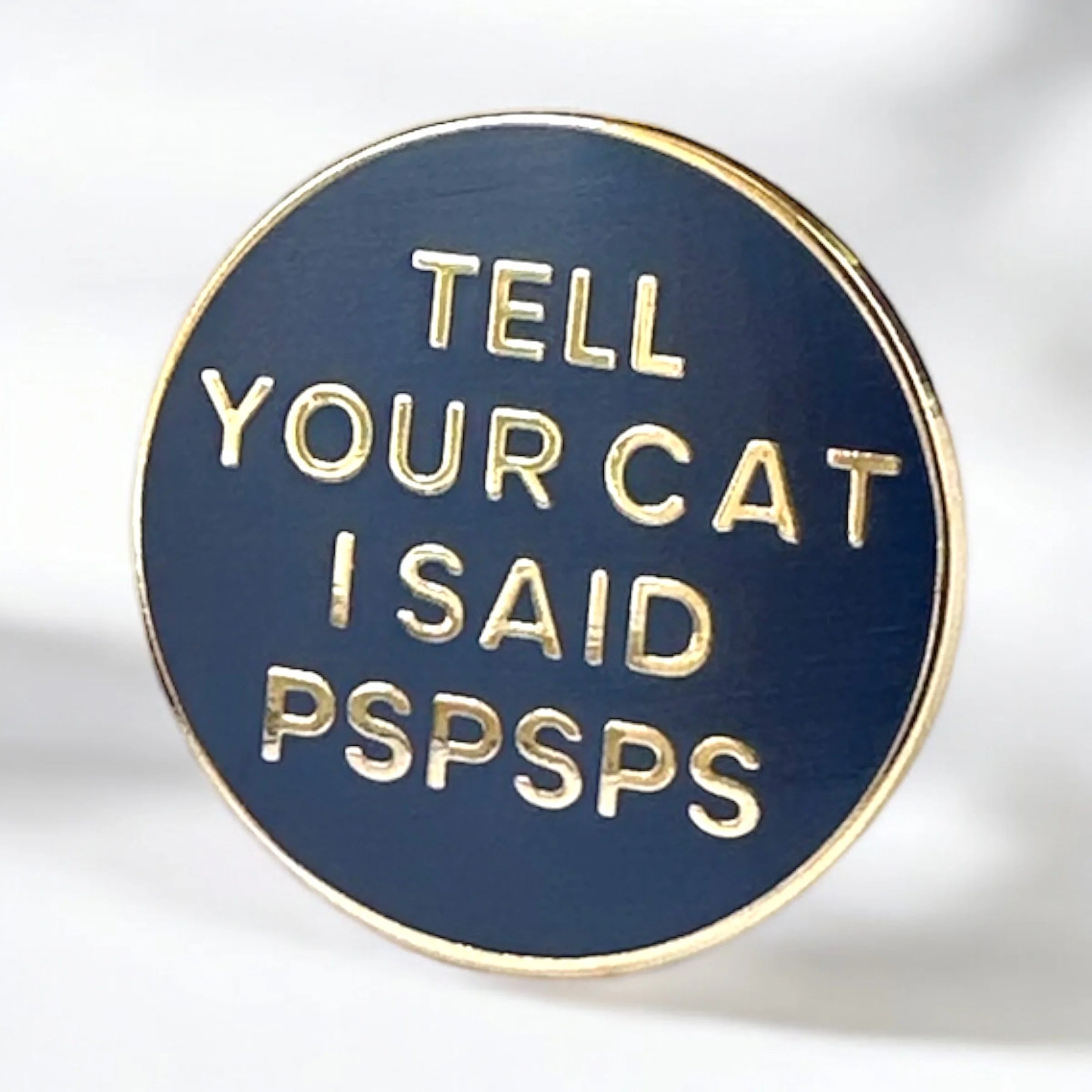 Tell Your Cat I Said Pspsps hard enamel pin in navy and gold