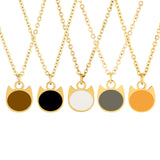 Five cat-shaped pendants on gold chains with different color options on a white background.