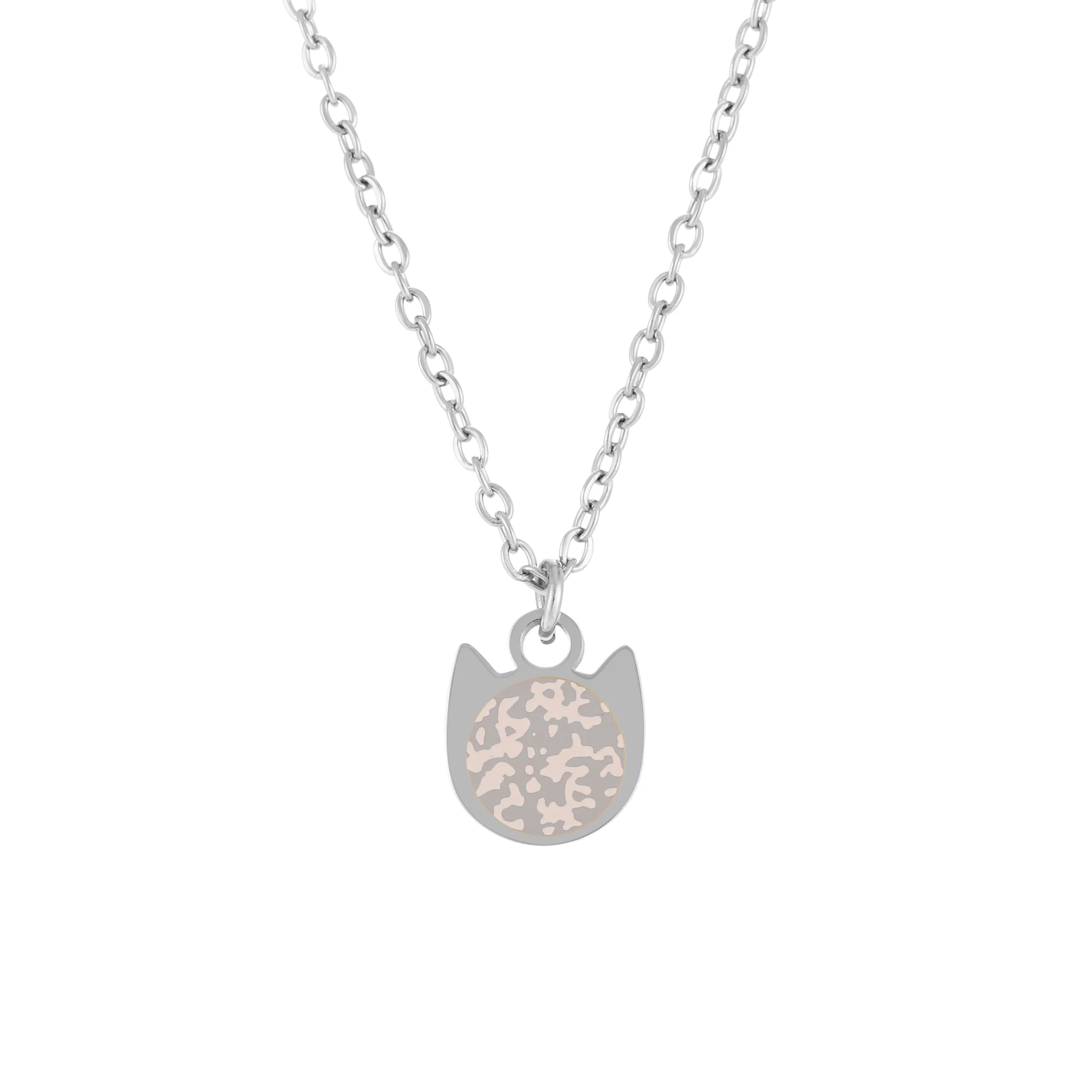 A silver chain necklace with a cat-shaped pendant featuring a textured, speckled light pink and silver center, shown against a plain white background.
