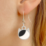Asymmetrical minimalist cat earrings in silver or gold with an asymmetrical two-tone cat silhouette charm