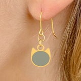 Solid minimalist cat earrings in silver or gold with a solid-color cat silhouette charm