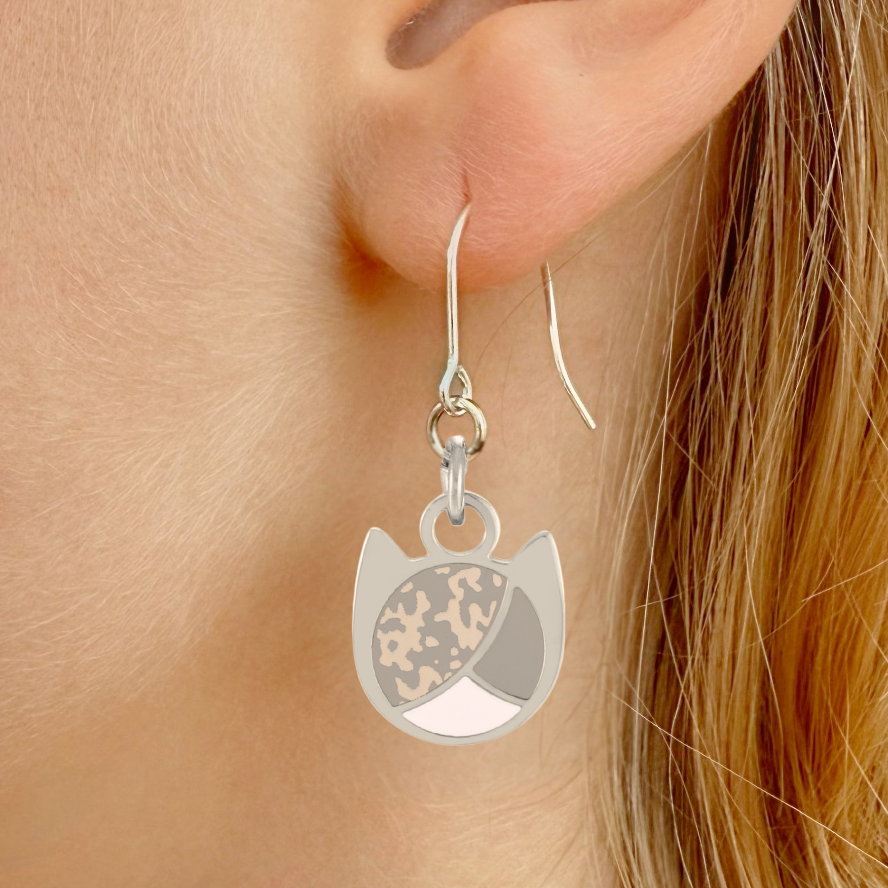 Tri-color minimalist cat earrings in silver or gold with a three-color cat silhouette charm