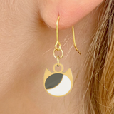Asymmetrical minimalist cat earrings in silver or gold with an asymmetrical two-tone cat silhouette charm