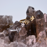 Adjustable bee and honeycomb ring in silver or gold with a bee charm and two CZ stones