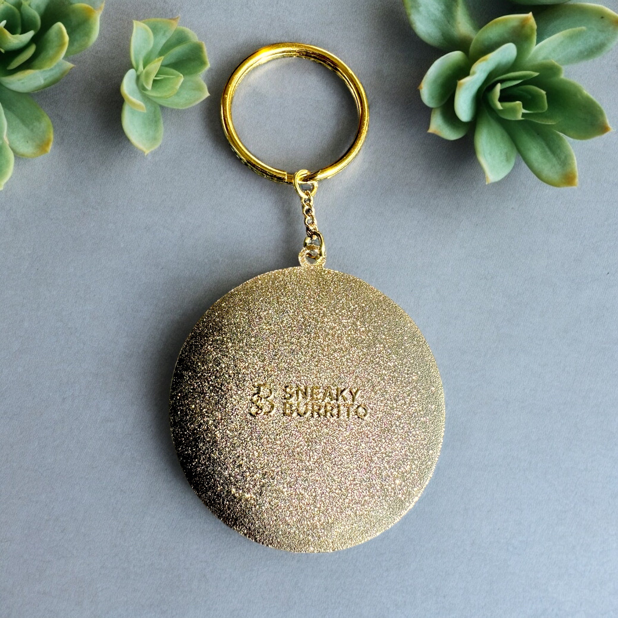 Be Kind & Stay Weird enamel keychain with hand-lettered text in gold plating