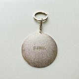 Tell Your Cat I Said Pspsps enamel keychain in navy and gold