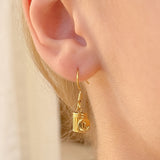 Trash Panda raccoon dangle earrings in silver or gold with a dangling raccoon charm and CZ stones