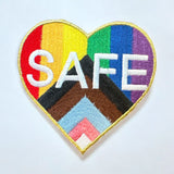 Embroidered rainbow patch with the word SAFE